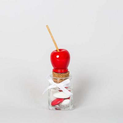 Contenant à dragées déco pomme d' amour sur pot en verre carre